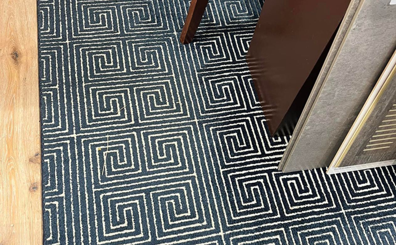 black and white spiral patterned area rug