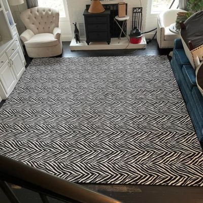 patterned carpet in a living room black and white